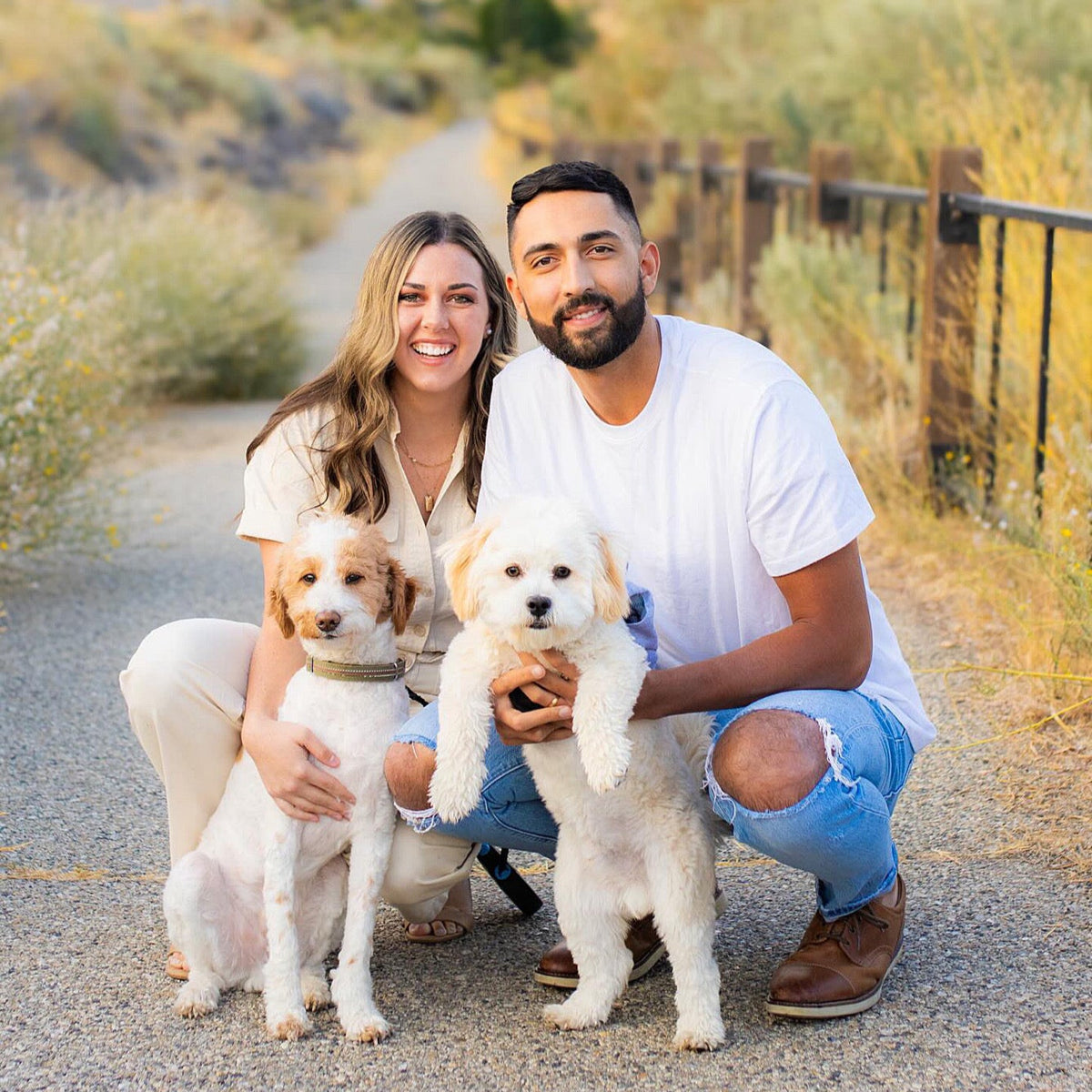 Jordan, Ammon, and their dogs outdoors